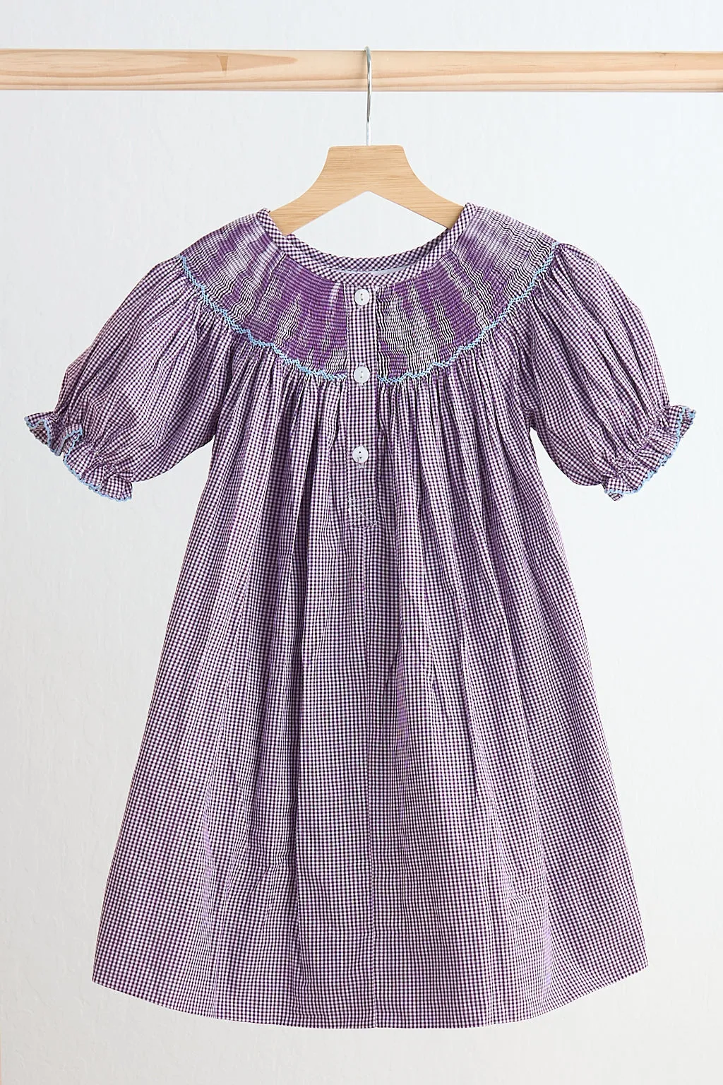 Purple castle hand smocked gingham dress