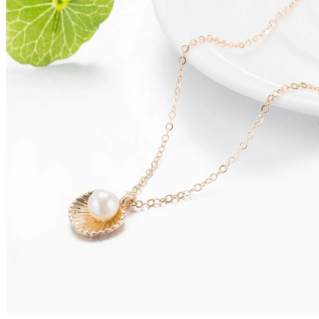 Yellow Chimes Pendant for Woemn Pearl Studded Rose Gold Plated Chain Pendant for Girls and Women