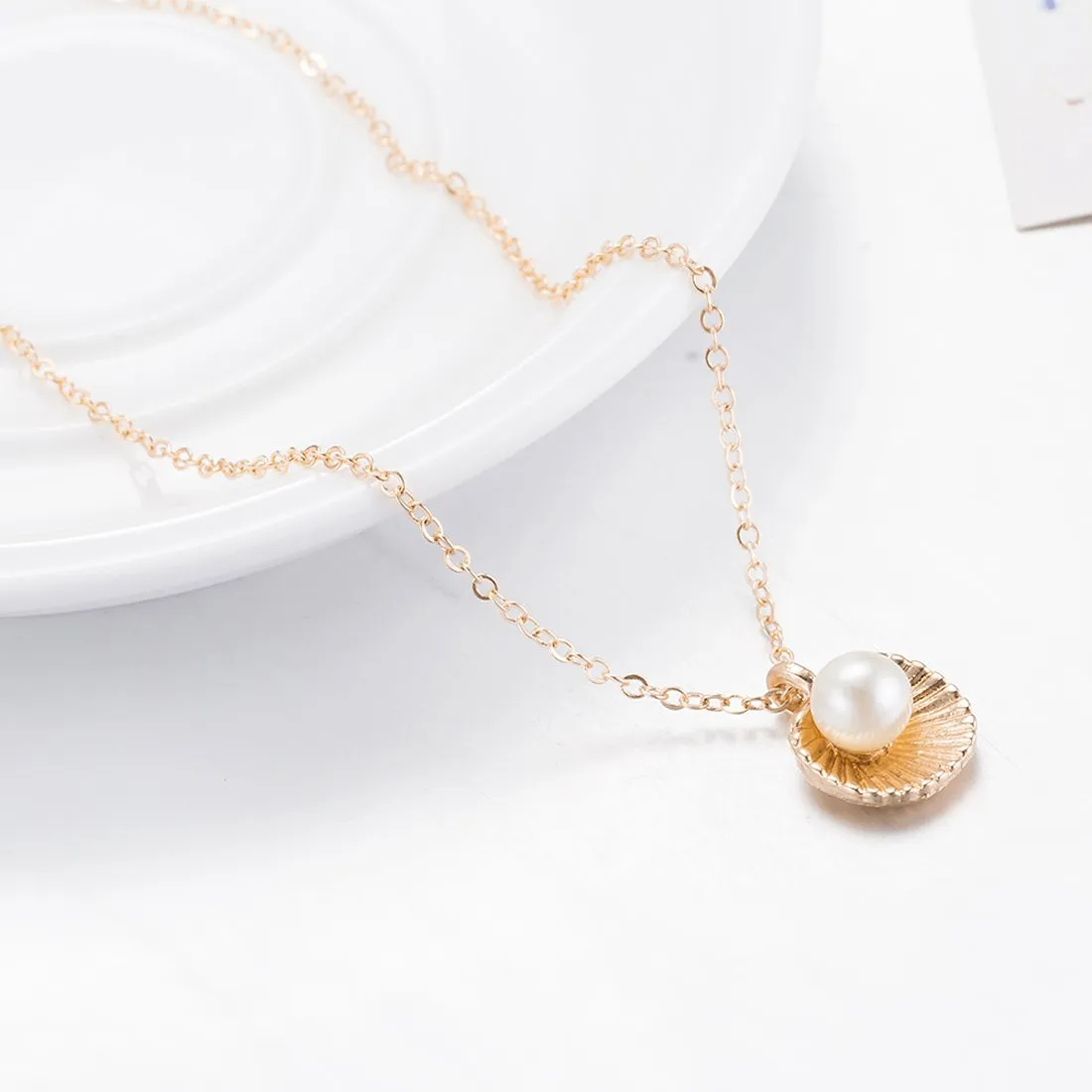 Yellow Chimes Pendant for Woemn Pearl Studded Rose Gold Plated Chain Pendant for Girls and Women